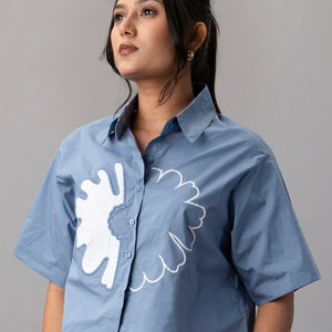 Blue Cropped Shirt with Oversized White Appliqué Flower