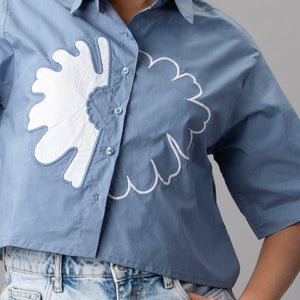 Blue Cropped Shirt with Oversized White Appliqué Flower