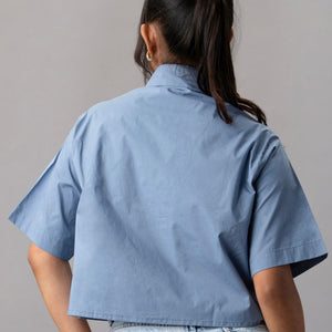 Blue Cropped Shirt with Oversized White Appliqué Flower