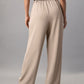 Beige Loose Fit High-Rise Pleated Formal Trousers for Women